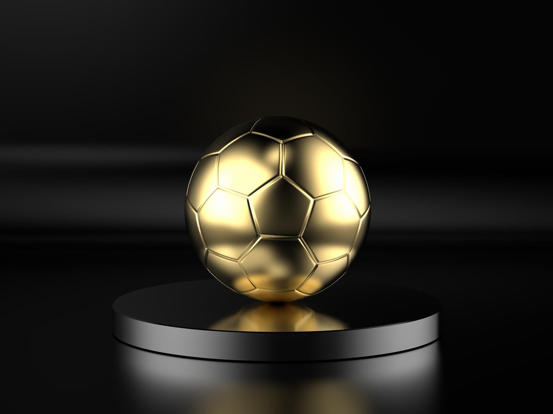 Golden Soccer Ball on Black Background