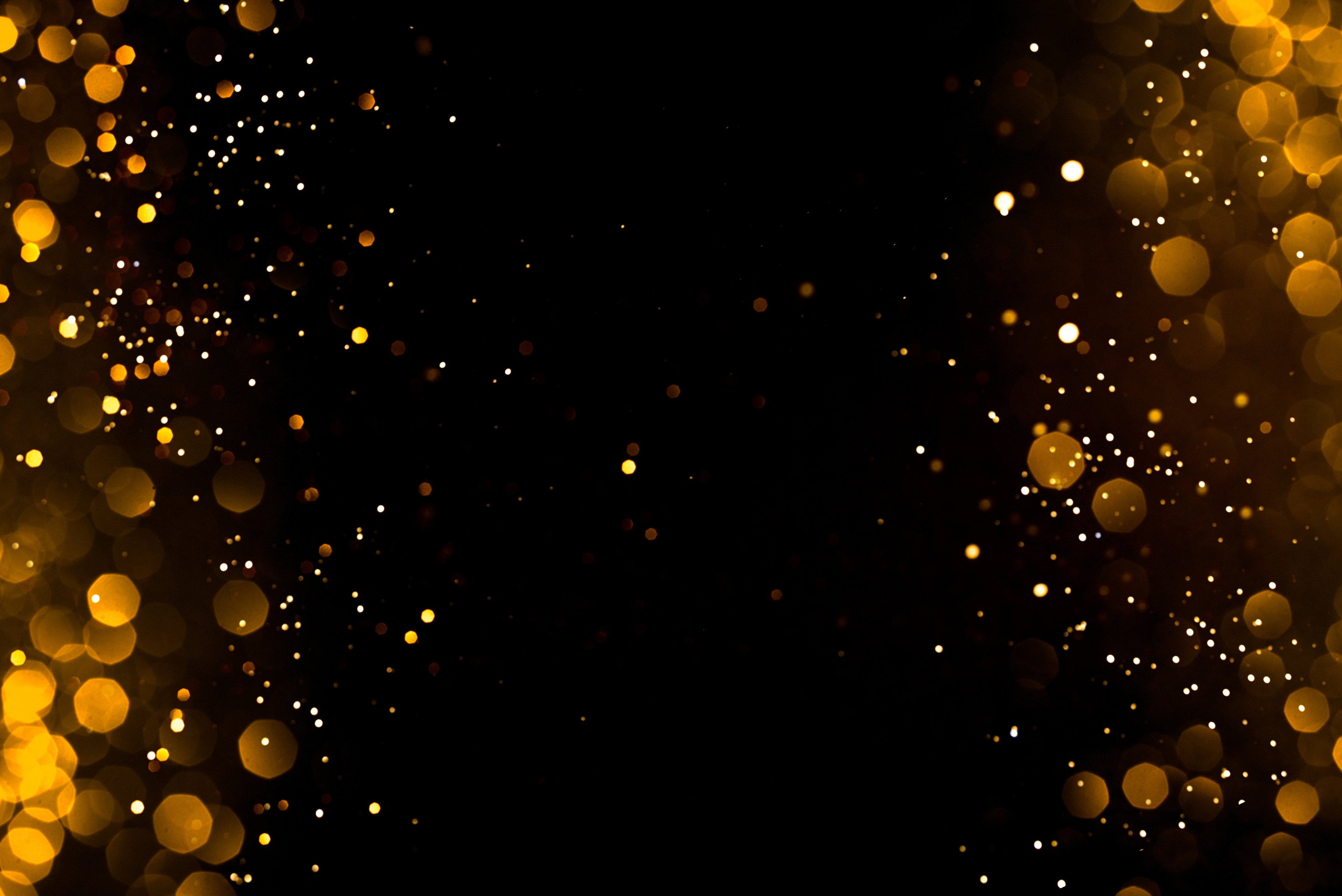 Golden Abstract Bokeh on Black Background